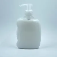 Hand pump dispenser filled with a white color dish soap.