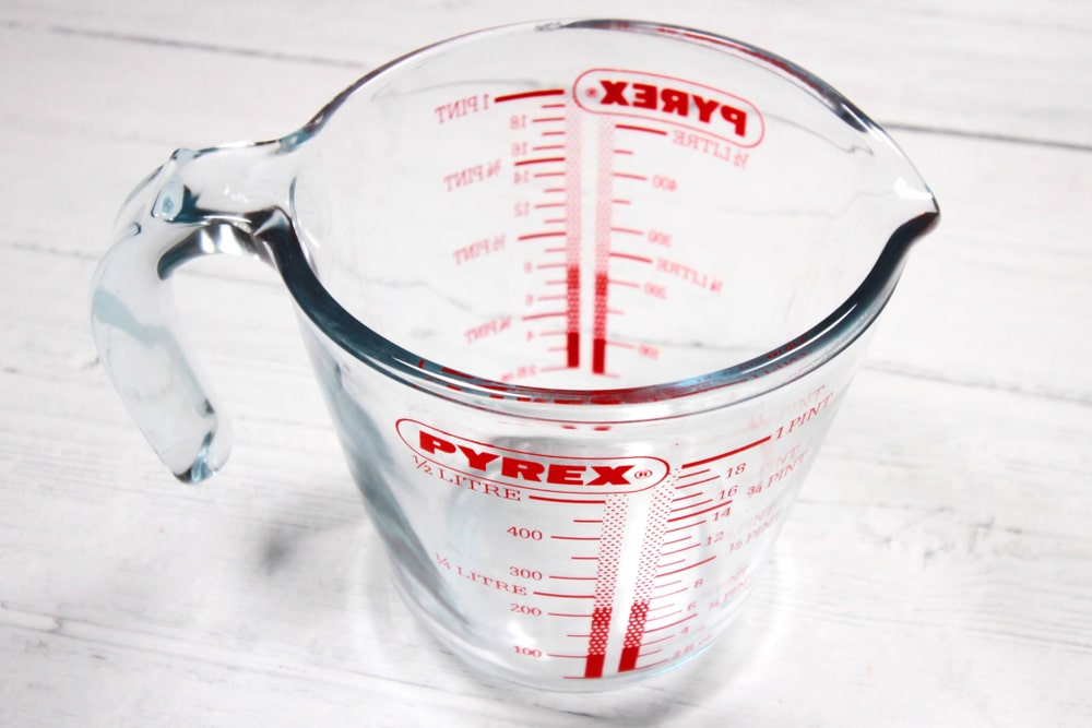 Pyrex glass cup.