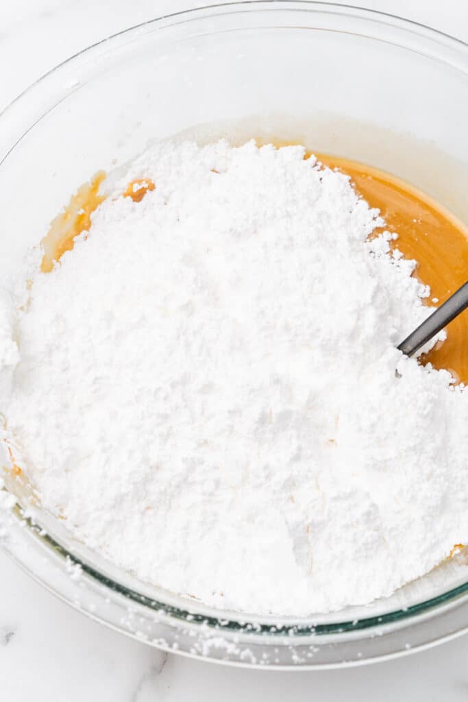 Powdered sugar in glass bowl.