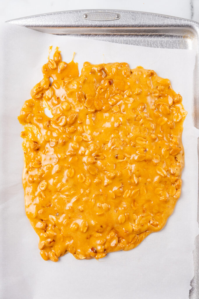 Gooey brittle with peanuts.
